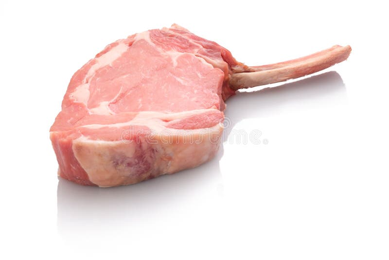 Veal cutlet with bone on white