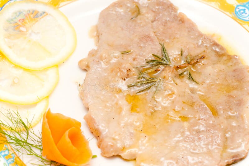 Veal with lemon sauce stock photo. Image of herbs, beef 25416390