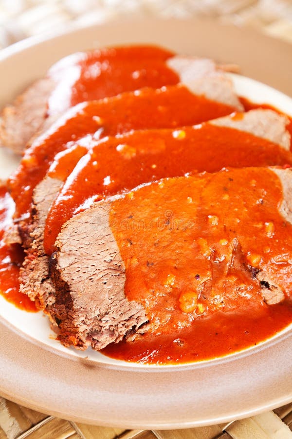 Veal with tomato sauce stock image. Image of portion 48937243