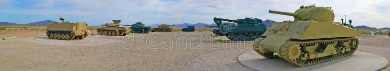 A panoramic view of a public display of old military tanks and troop carriers. Found near the Yuma Proving Ground, a United States Army facility -30 miles north-east of Yuma, Arizona. A panoramic view of a public display of old military tanks and troop carriers. Found near the Yuma Proving Ground, a United States Army facility -30 miles north-east of Yuma, Arizona