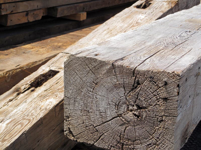 A closeup of old wooden richly textured building support beams. A closeup of old wooden richly textured building support beams.