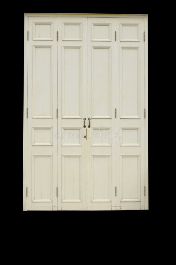 Vecchia e porta bianca di legno antica isolata su fondo nero fotografia stock libera da diritti Vecchia e porta bianca di legno antica isolata su fondo nero fotografia stock libera da diritti