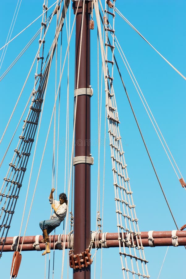 Ship foremast, cordage and sailor. Ship foremast, cordage and sailor