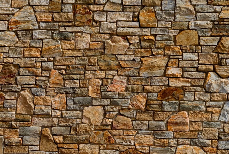 Vecchia struttura variopinta della parete di pietra fotografie stock Vecchia struttura variopinta della parete di pietra fotografie stock