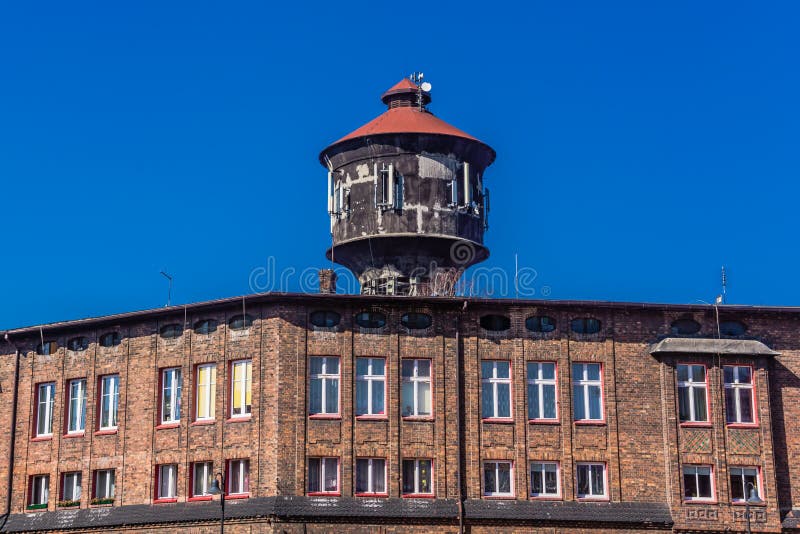 Vecchia torre di acqua in Nikiszowiec fotografie stock libere da diritti Vecchia torre di acqua in Nikiszowiec fotografie stock libere da diritti