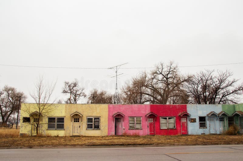 Exterior of a colorful brick motel building. Exterior of a colorful brick motel building