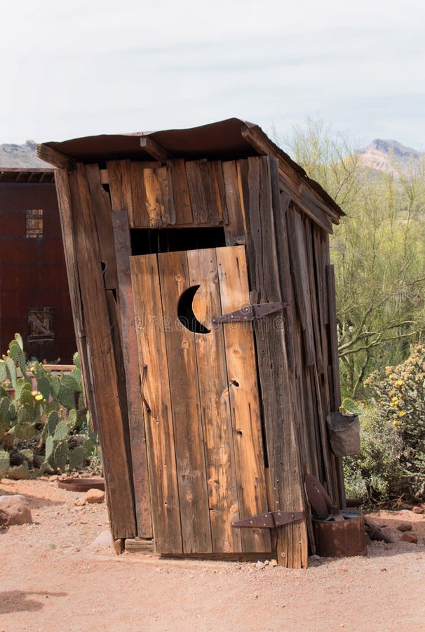 Crooked old wild west outhouse in the desert. Crooked old wild west outhouse in the desert