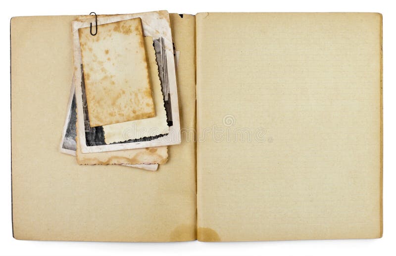 Vecchio diario aperto in bianco con le foto