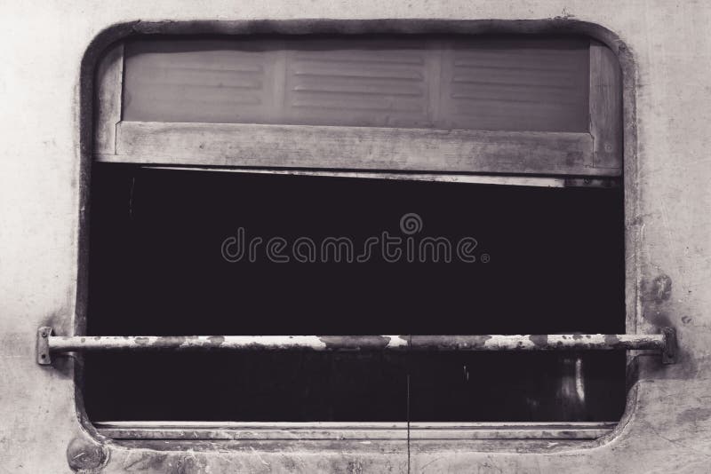 Vecchio fondo abbandonato della finestra arrugginita del vagonetto fotografia stock Vecchio fondo abbandonato della finestra arrugginita del vagonetto fotografia stock