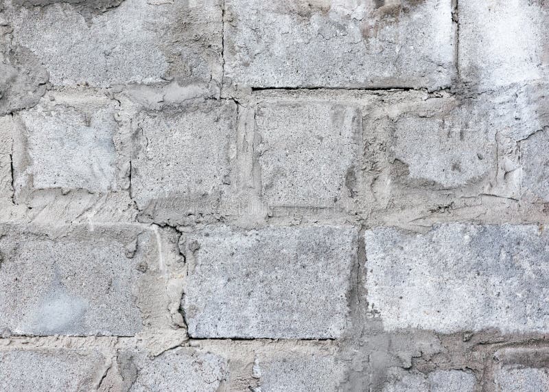 Vecchio fondo della parete del blocco in calcestruzzo - struttura di lerciume fotografia stock libera da diritti Vecchio fondo della parete del blocco in calcestruzzo - struttura di lerciume fotografia stock libera da diritti