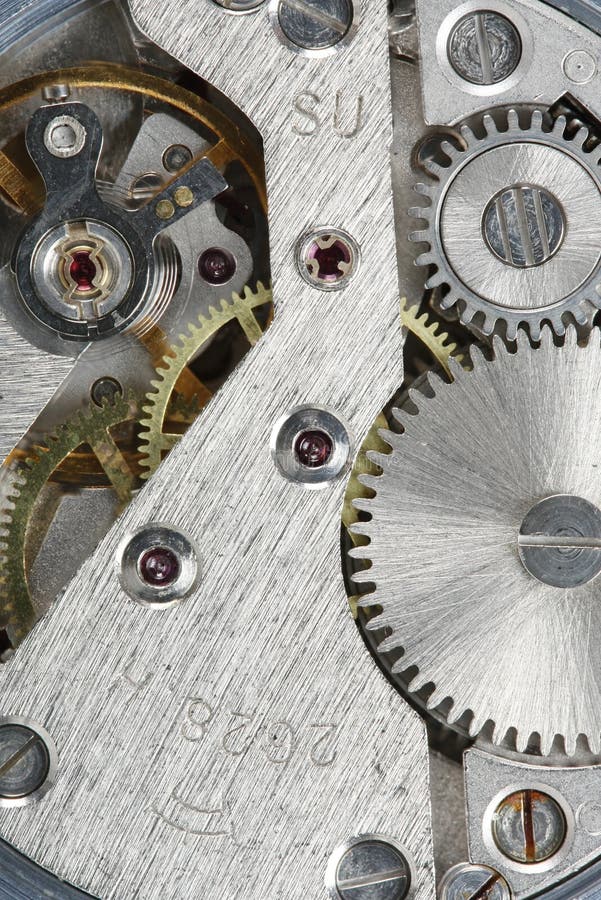 Vecchio meccanismo di ingranaggio dell'orologio fotografia stock Vecchio meccanismo di ingranaggio dell'orologio fotografia stock