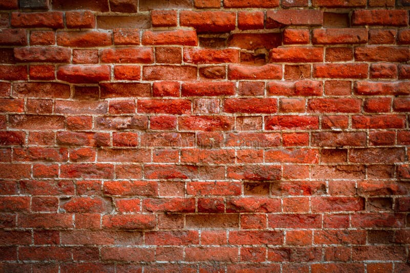 Vecchio muro di mattoni rossi con tantissima texture e colori fotografia stock libera da diritti Vecchio muro di mattoni rossi con tantissima texture e colori fotografia stock libera da diritti