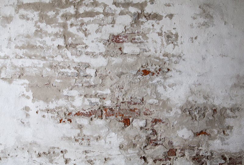 Vecchio muro di mattoni rosso con struttura concreta incrinata del fondo immagini stock Vecchio muro di mattoni rosso con struttura concreta incrinata del fondo immagini stock