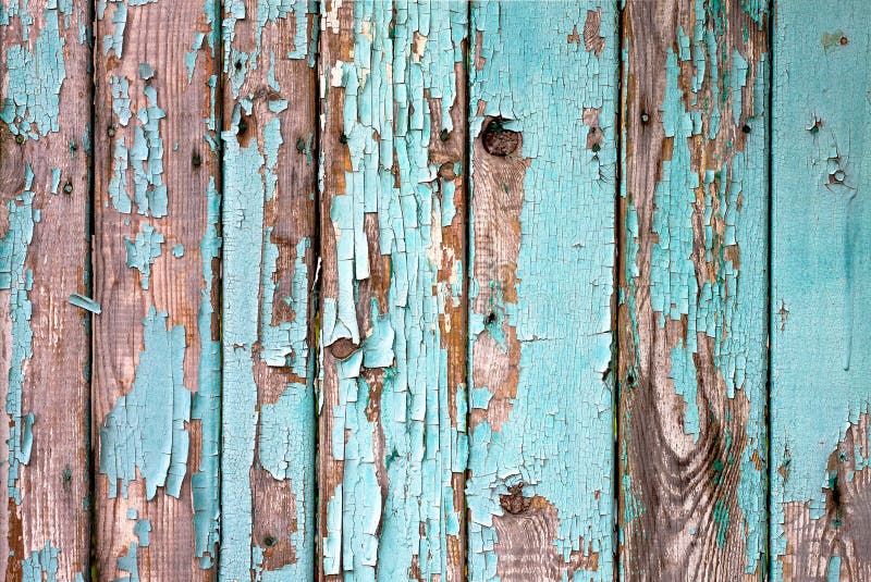 Vecchio recinto rustico blu-chiaro dipinto di legno, fondo della sbucciatura della pittura