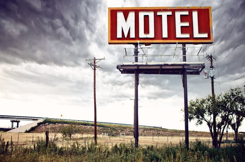 Vecchio segno del motel sull'itinerario 66, U.S.A.