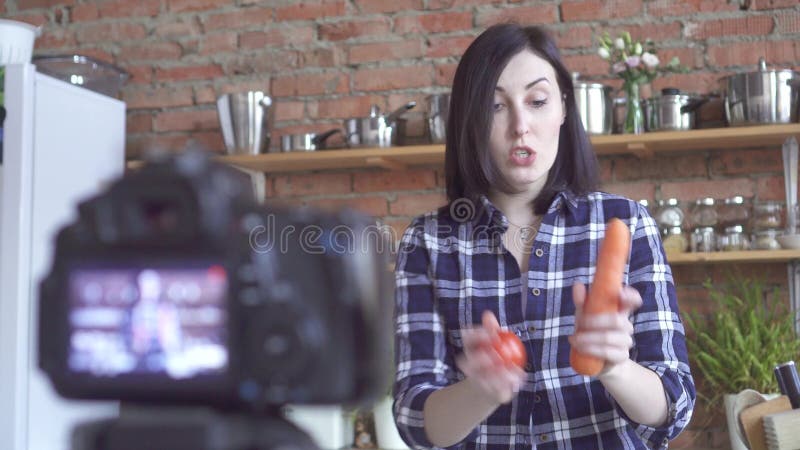 Portrait of a Vegan Blogger Girl Who Talks on a Webcam How To Cook Vegetables Stock Video - Video of food, happy: 131623163