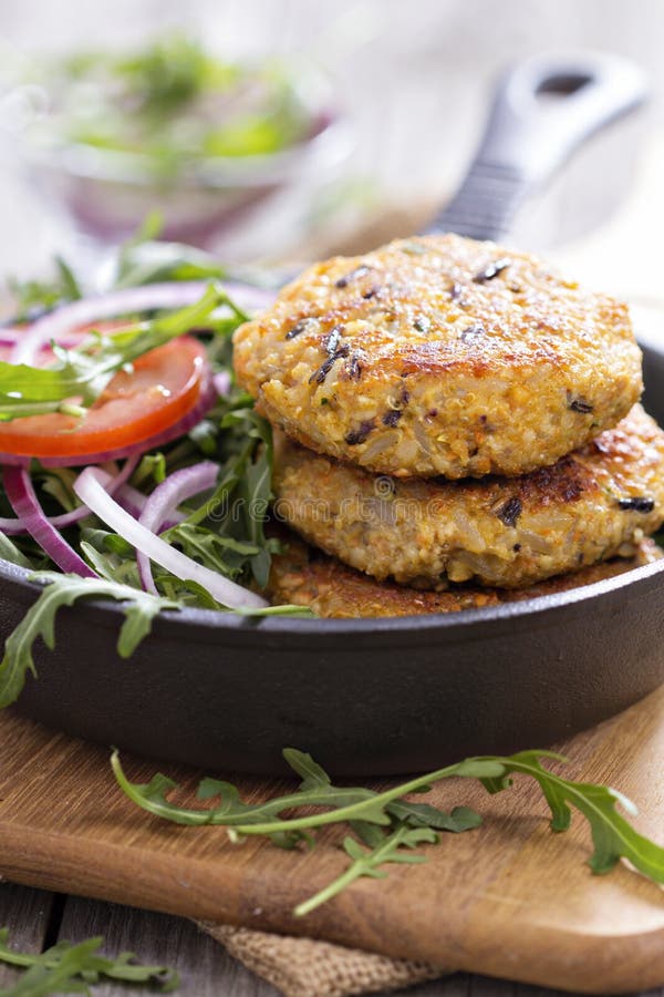 Vegan burgers with quinoa and vegetables stock photos Vegan burgers with quinoa and vegetables stock photos