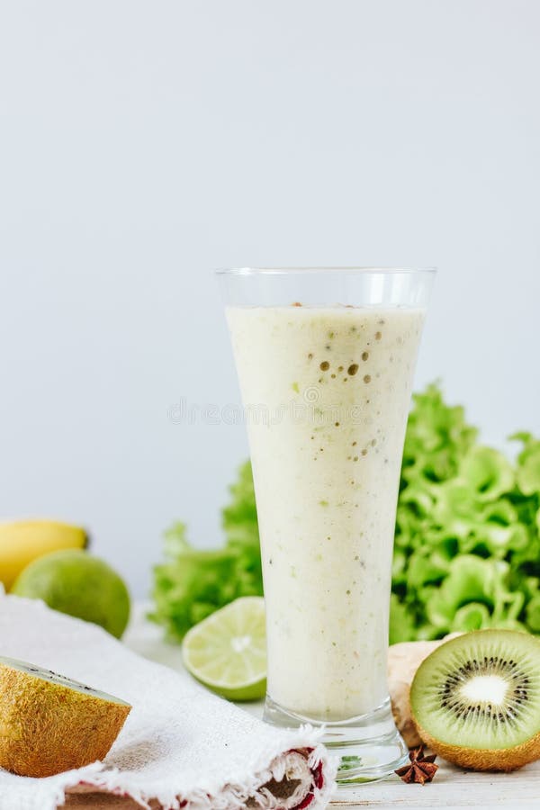 Vegan Drink Smothie Made from Fresh Ginger and Fruits. Stock Photo