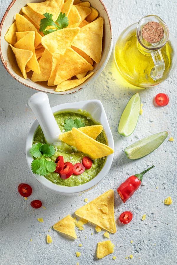 Vegan Guacamole with Tortilla, Coriander and Chilli Peppers Stock Image