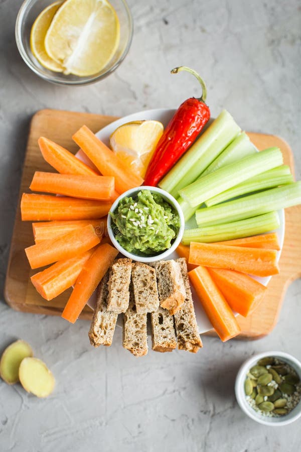 Vegan Healthy Snacks Guacamole, Carrots, Celery Stock Image Image of