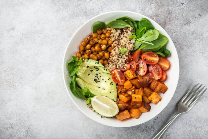 Vegan κύπελλο μεσημεριανού γεύματος Healhty Αβοκάντο, quinoa, γλυκιά πατάτα, ντομάτα, στοκ φωτογραφία με δικαίωμα ελεύθερης χρήσης Vegan κύπελλο μεσημεριανού γεύματος Healhty Αβοκάντο, quinoa, γλυκιά πατάτα, ντομάτα, στοκ φωτογραφία με δικαίωμα ελεύθερης χρήσης