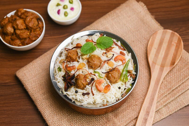 Vegetable biryani or Andhra style soya dum biryani ,Soya Chunks Pulao and raita. Spicy Indian Malabar biriyani or Hydrabadi biryani, Dum Biriyani, pulao, pulav, pilaf, basmati rice, spicy mixed rice dish with meat curry for Ramadan Kareem, Eid Hyderabad India. Basmati rice popular festival Lankan food Sri Lanka. Lankan food. Chicken dum biryani stock images, royalty-free photos and pictures