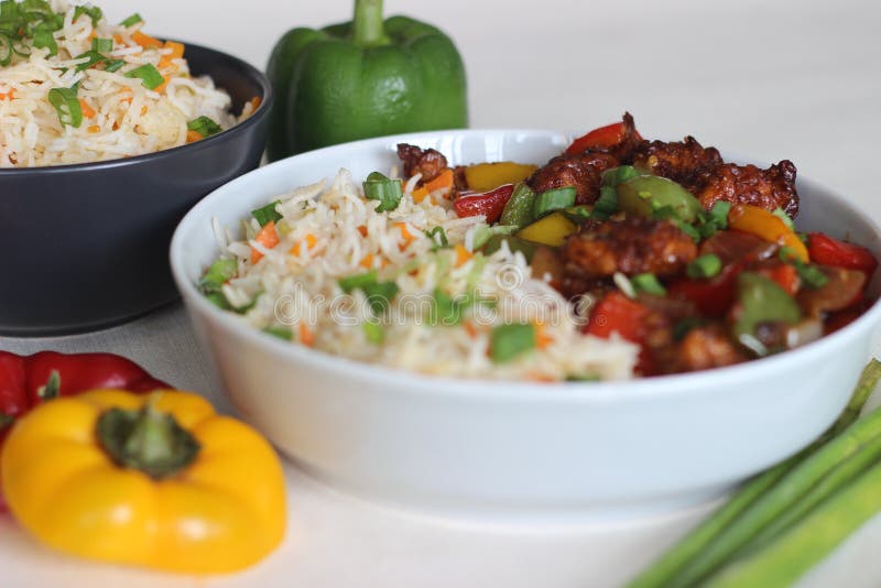 Vegetable Carrot Fried Rice with Indian Spices Served Along with Chilly