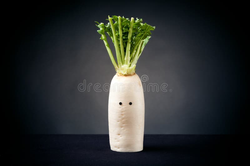 Photo Of Radish With Funny Eyes Stock Photo Image of leaf, background