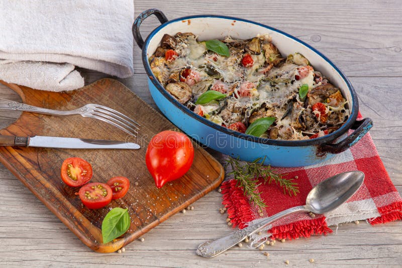 Vegetable gratin in a dish stock image. Image of towel 197959437