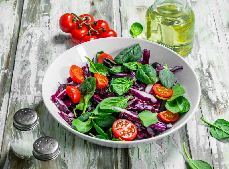 Vegetable Salad. Red Cabbage, Tomato And Spinach Salad With Olive Oil