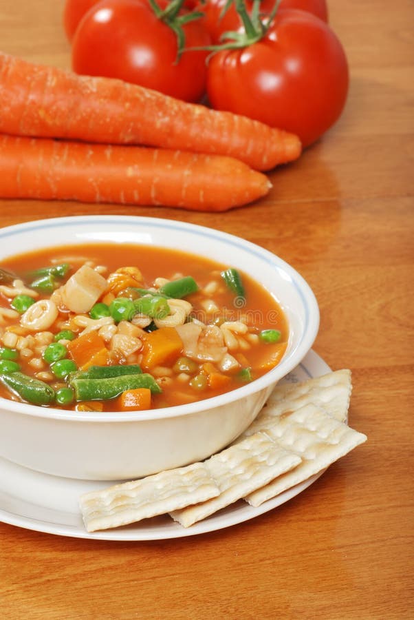 Vegetable soup with crackers fresh carrots tomato stock images Vegetable soup with crackers fresh carrots tomato stock images
