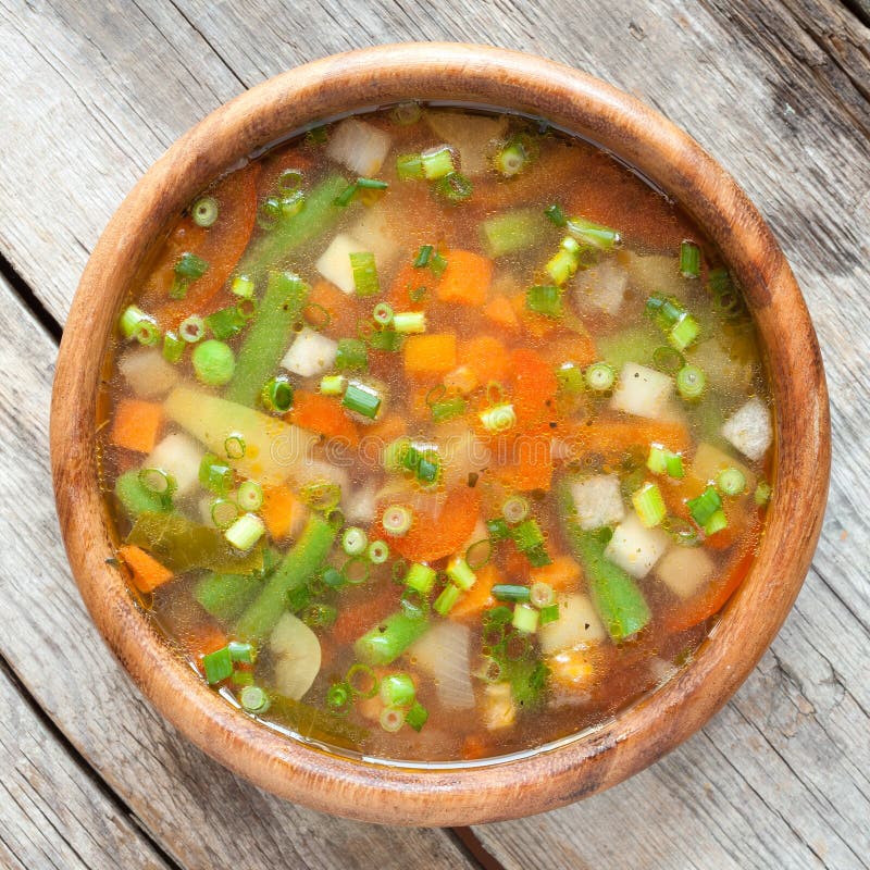 Vegetable soup in wooden bow