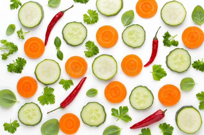 Vegetable and spices isolated on white background, top view. Wallpaper abstract composition of vegetables