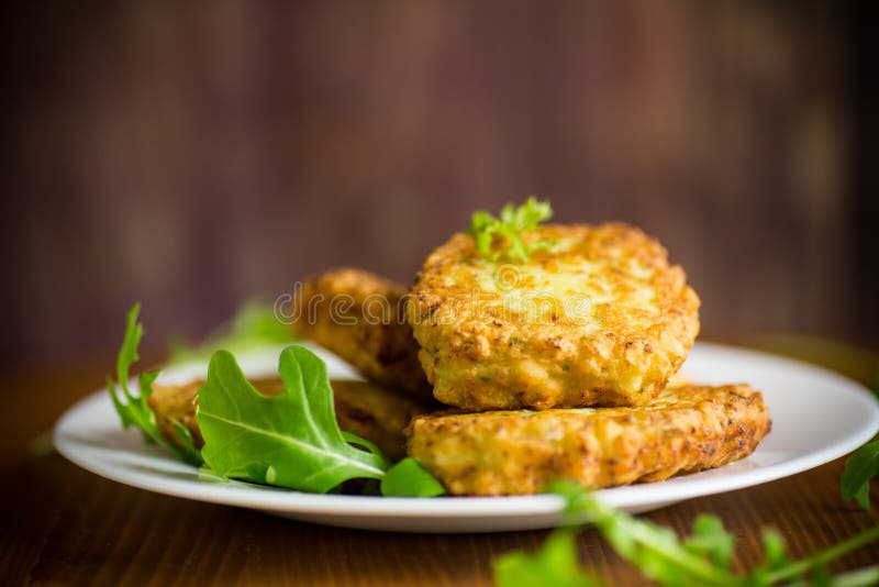 Vegetable Vegetarian Fried Cabbage Pancakes in a Plate Stock Photo