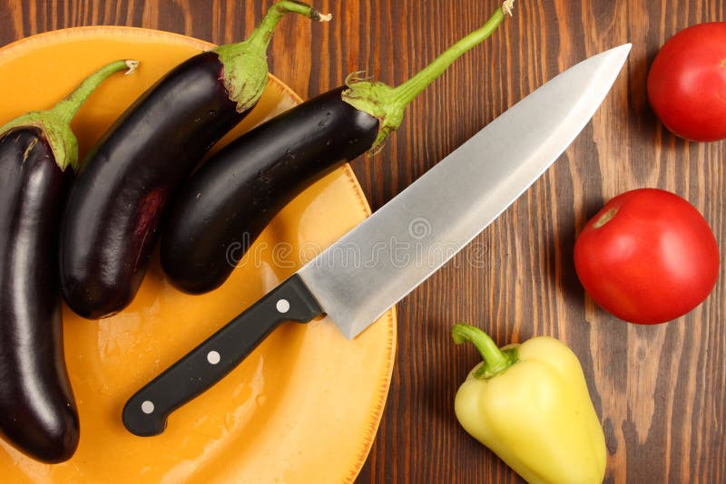 Chef Knife on Wooden Chopping Board with Fresh Vegetables Background.  Healthy Eating Concept. Vegetarian Raw Food Stock Photo - Alamy