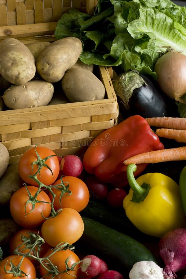 Vegetables around basket