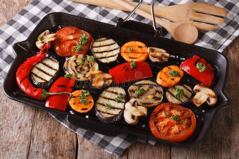 Vegetables Cooked on the Grill Pan Closeup. Horizontal Stock Photo