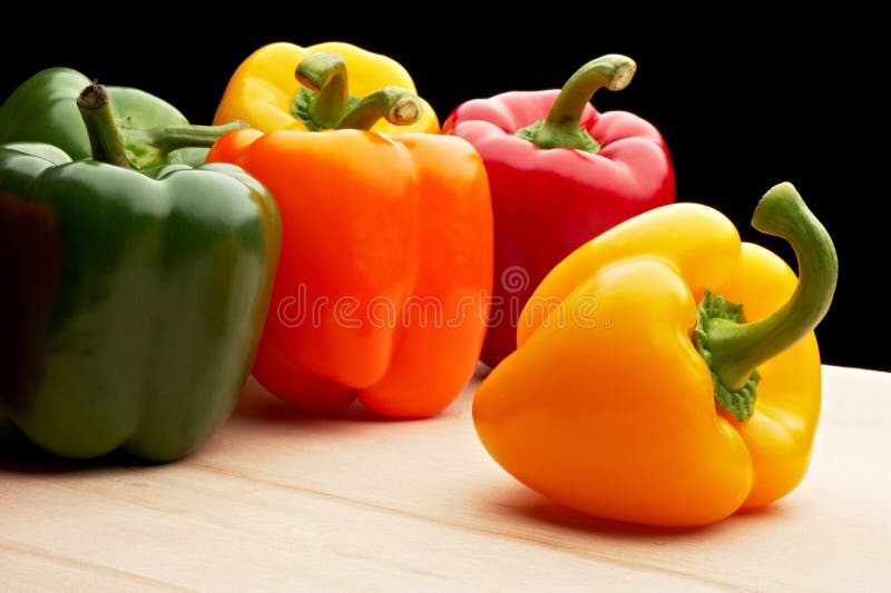 Vegetables - Peppers on black background