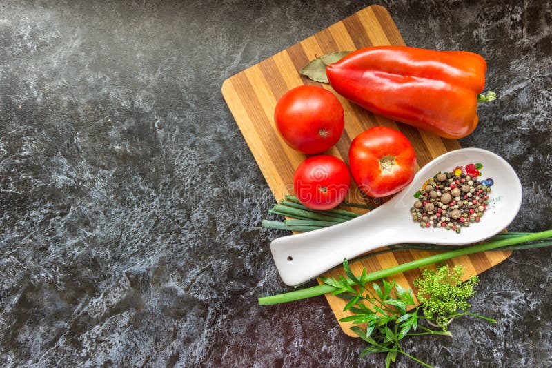 Vegetables and spices for cooking various dishes and a salad on stock photography Vegetables and spices for cooking various dishes and a salad on stock photography