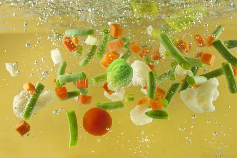 Vegetables Splash in Water Soup Cooking Concept Stock Photo Image of