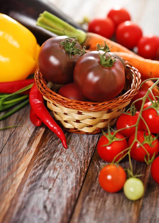 Vegetables still life in wooden background