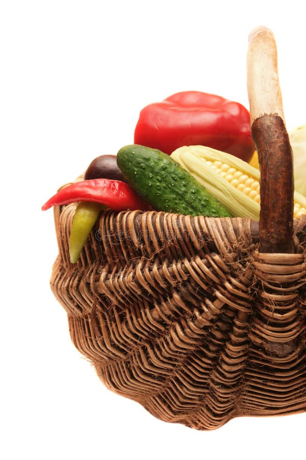 Vegetables in wood basket.