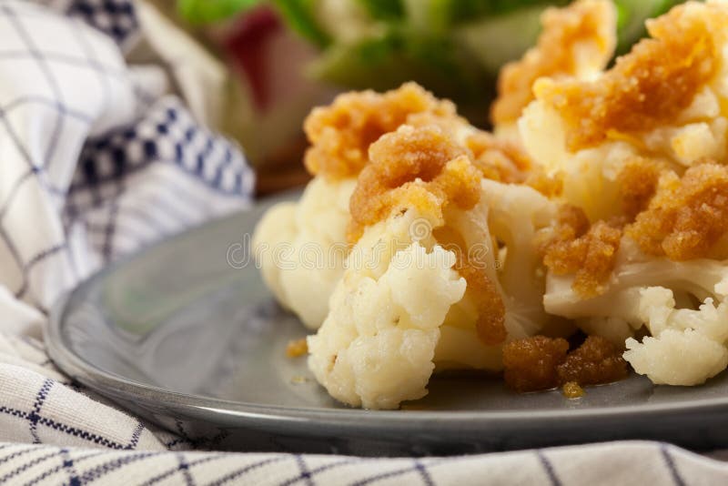 Vegetarian cooked cauliflower with bread crumb