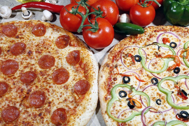 Vegetarian and pepperoni pizza combo stock photos