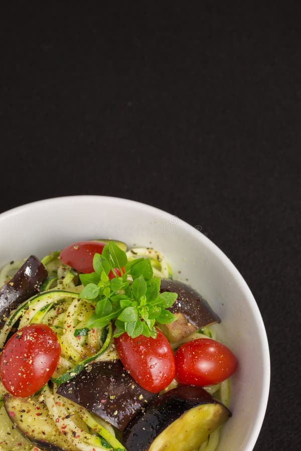Vegetarian Zucchini Noodles with Tomatoes and Eggplant Stock Image