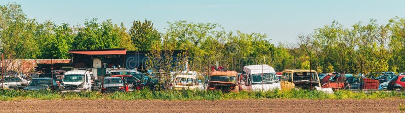 Vehicle graveyard in rural environment royalty free stock photo