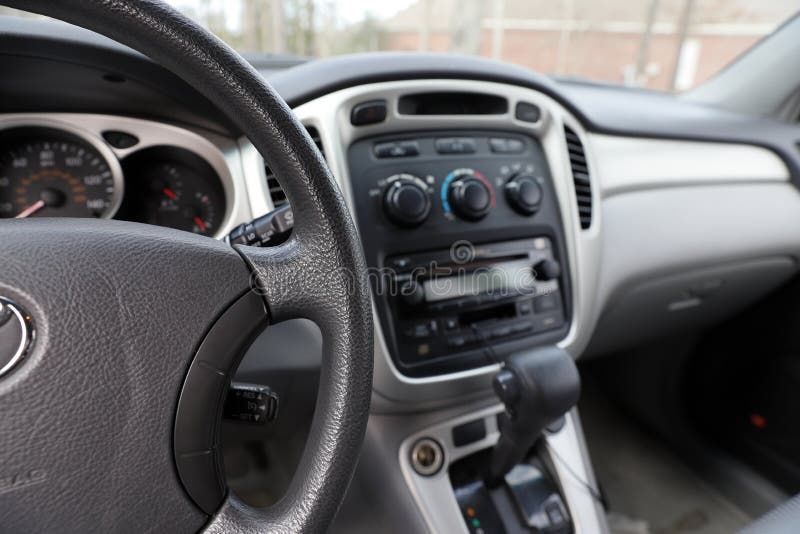 Automobile Interior with Steering Wheel, Gear Shift and Controls Stock
