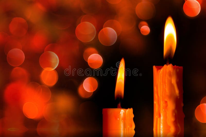 Christmas Candle Burning In Dark And Light bokeh. Christmas Candle Burning In Dark And Light bokeh