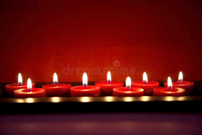 Velas rojas ardientes foto de archivo libre de regalías Velas rojas ardientes foto de archivo libre de regalías
