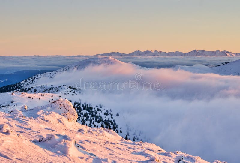 Velka Hola mountain in Low Tatras mountains during winter sunrise